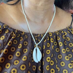 Rhorho - giant cowrie necklace on a happy customer - made with passion by Homba Crafts